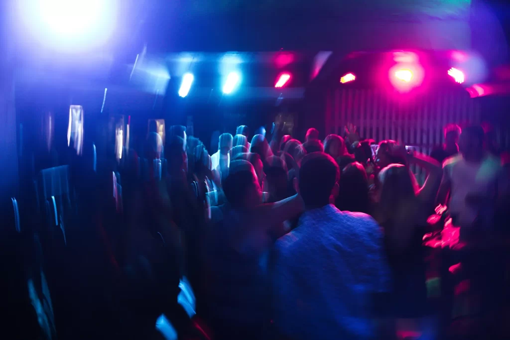 People dancing at DJ party